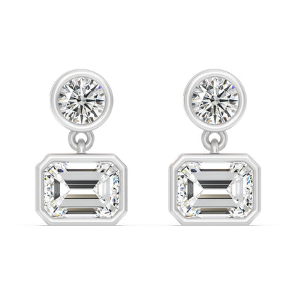 SOHO DROP EARRING, BRILLIANT CUT DIAMOND WITH A EMERALD CUT DROP DIAMOND SET IN 14K GOLD.